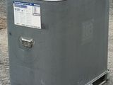 an image of an air conditioner sitting on the ground