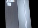 two boxes of nintendo wii controllers on a black background