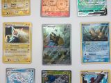 beaucoup de cartes pokemon sur le mur
