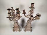 pair of antique cast iron candelabs