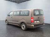 a brown van that is parked in a room