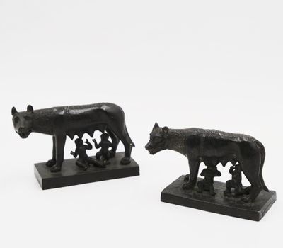 pair of bronze figurines of a bear and a bear cub