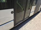 a bus that is parked on the side of the street