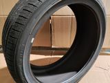 a close up of a tire on a cardboard box