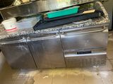 an image of a kitchen with a stove and a sink