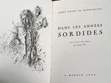 an open book with a drawing of a man and a woman