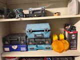 many tools on a shelf in a room