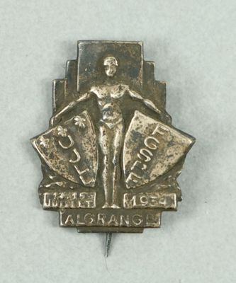 an image of a silver medal with a man holding a shield