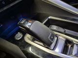 a remote control in the center console of a car
