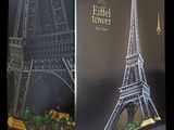 une boîte contenant une tour Eiffel en Lego