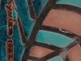 a close up of a plate with a design on it