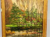 une peinture représentant une peinture d'arbres et d'eau, dans un cadre doré