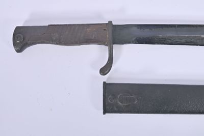 a knife that is laying on a table