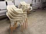 several chairs are lined up in a row in a room