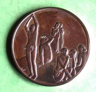 an image of a bronze medal with a man and a woman on it