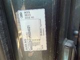 a close up of a car door with a sticker on it