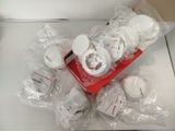 a lot of white plates and cups on the table