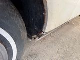 a close up of a tire on the side of a truck