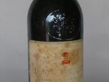 a bottle of wine that is sitting on a table