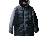 a black jacket with a hood on a hanger