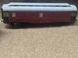 three toy trains sitting next to each other on the floor