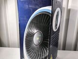 a box with a fan inside of it sitting on a table
