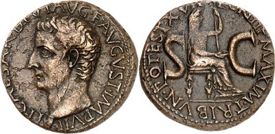 a silver coin with an image of a man on it