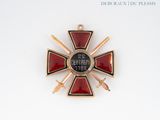 a red and gold cross on a white background