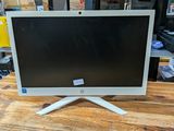 an image of a computer monitor sitting on top of a wooden table