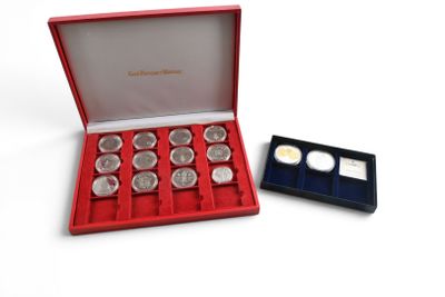 an image of a red box with six silver coins in it
