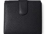 a black leather wallet with a card holder on top of it