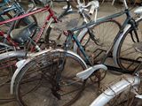 many bicycles that are parked in a garage