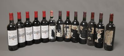 plusieurs bouteilles de vin sont alignées dans une rangée