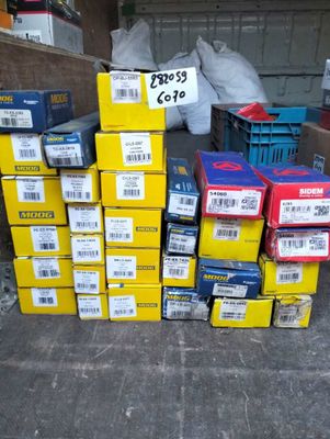 a pile of boxes and boxes on the ground