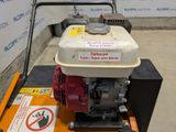 an image of a small gas engine on a pallet