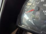 a close up of a speedometer on a motorcycle