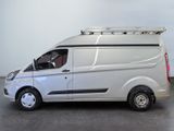 a white van that is parked in a parking lot