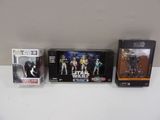 several star wars action figures are lined up on a table