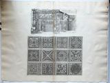 un vieux livre sur lequel figure le dessin d'un bâtiment