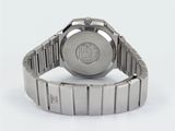 an image of a close up of a wrist watch on a white surface