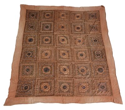 a brown and black rug on a white background