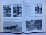 an open book with pictures of people in military uniforms