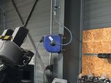 an image of a man working on a machine