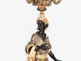 an image of a statue of a woman holding a candelier