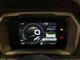 the dashboard of a car with a digital display on it