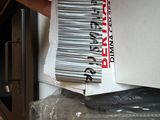a person that is holding a barcode in their hand