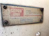 a sign on the wall that says cargo man
