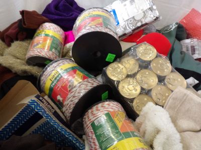 a pile of assorted items in a bin