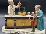 a figurine of a man and a woman at a bar
