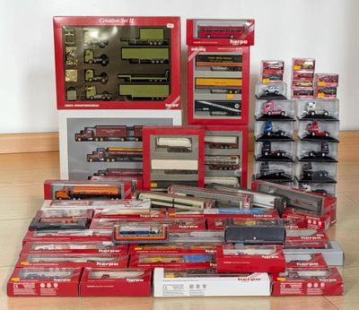 a lot of toy trains on display on the floor
